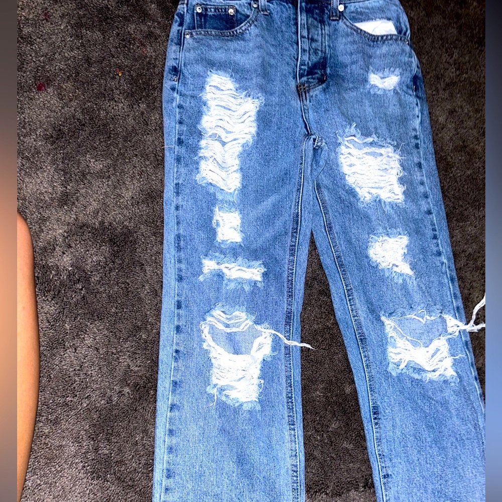 Rue 21 ripped wide-leg jeans. Size 1 short in women’s. Light blue denim.